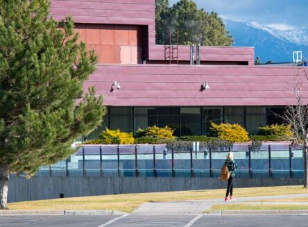 a student walks on campus