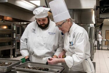 culinary student with Chef instructor