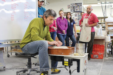 Ceramics Instructor demonstrates