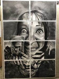 student artwork featuring a close-up monochromatic image of a face made up of eight different panels