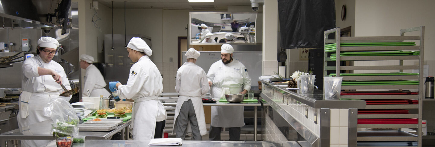 student chefs in a kitchen