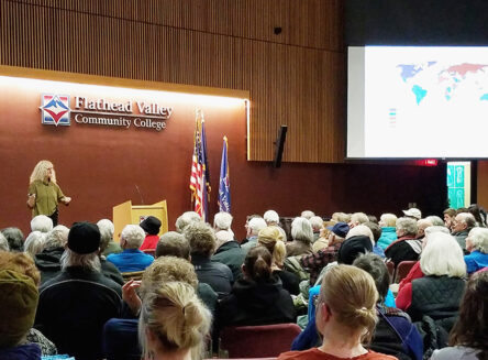 a speaker lectures to an audience