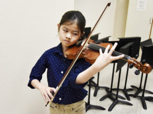 a child playing violin