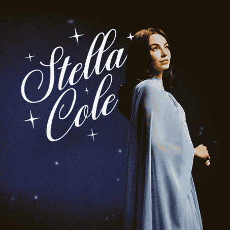 A dark blue and black promotional graphic for vocalist Stella Cole. The image features a woman in a light blue flowing cape looking upward and to the right. The name "Stella Cole" is written in large, elegant white script to her left, surrounded by small white stars.
